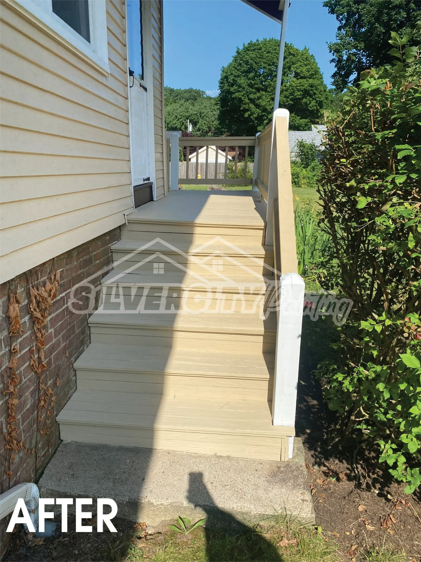 After painting — porch stairs and landing painted in a smooth tan exterior finish