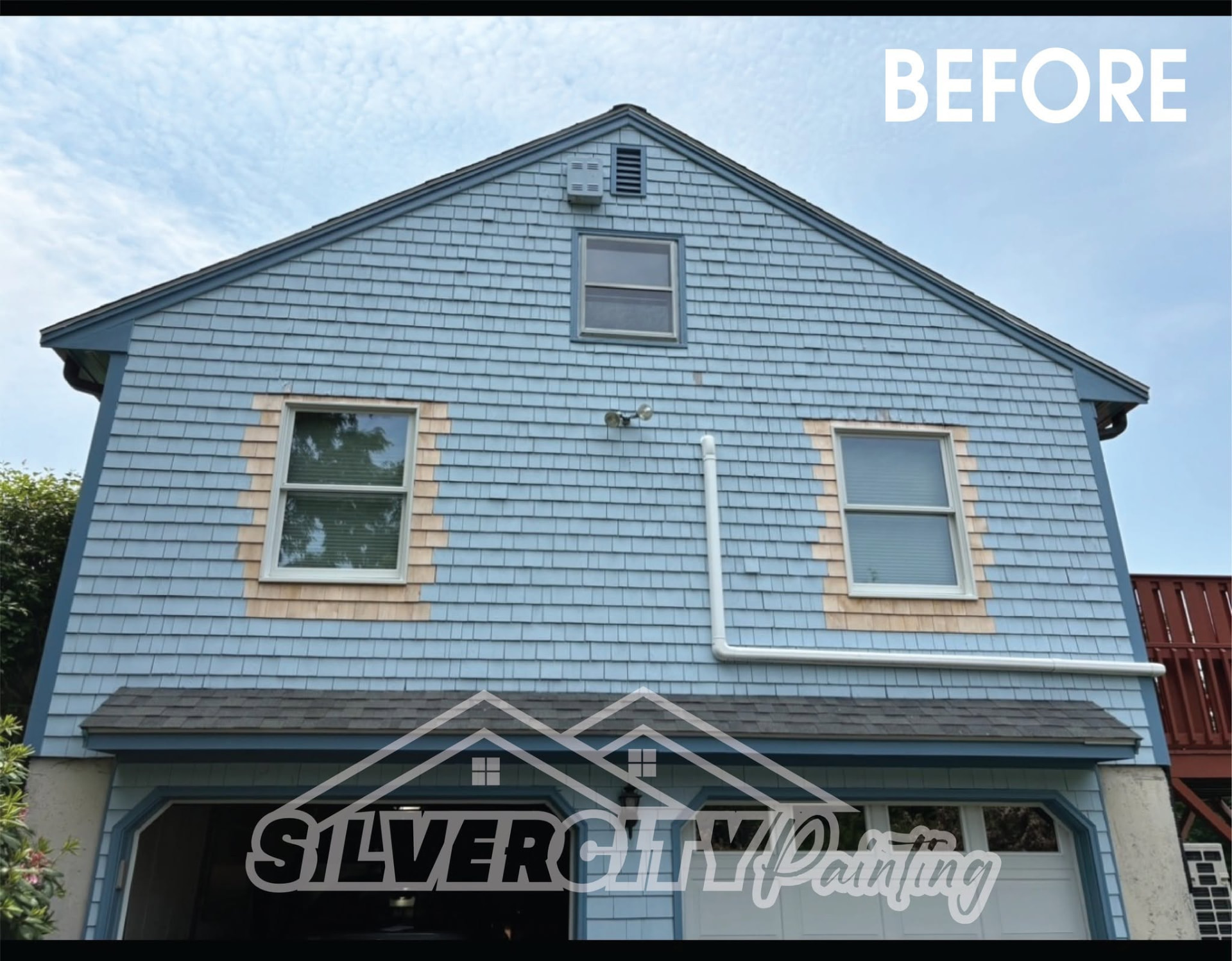 Before exterior painting — weathered blue cedar shingle siding with bare wood patches on a Taunton, MA home